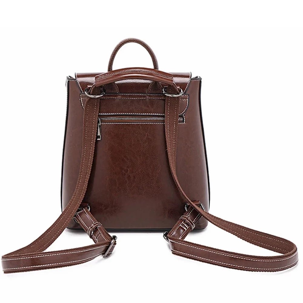 Sac à dos en cuir véritable marron avec bretelles ajustables et poche zippée arrière