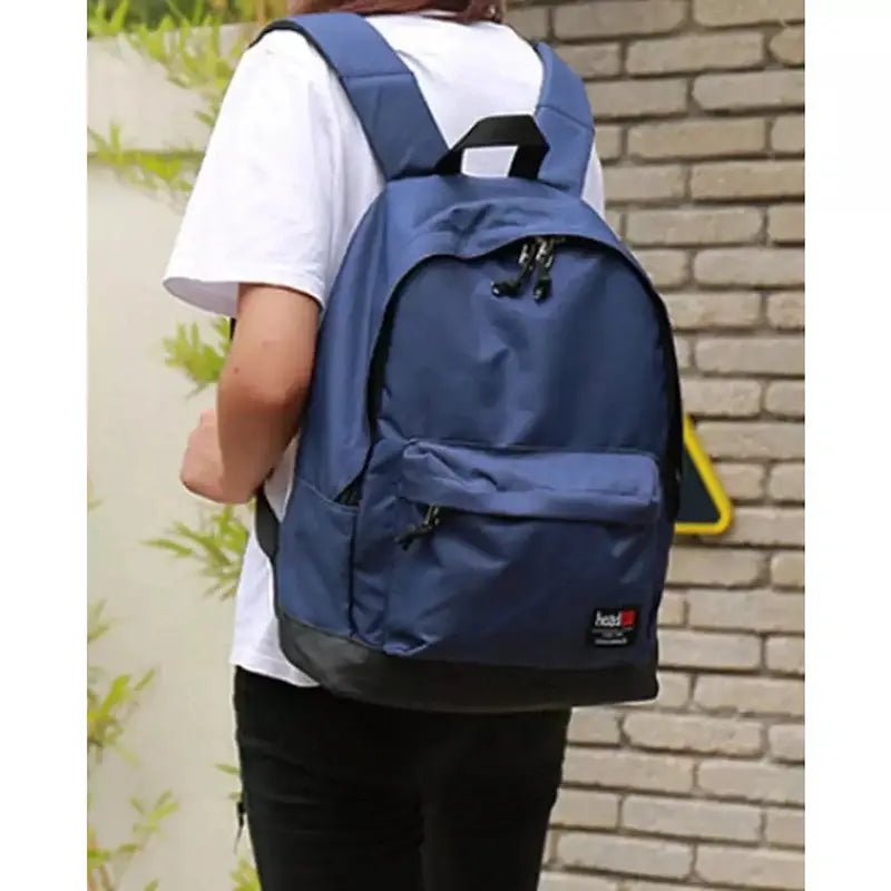 Sac à dos fille casual bleu marine avec base noire et poche frontale