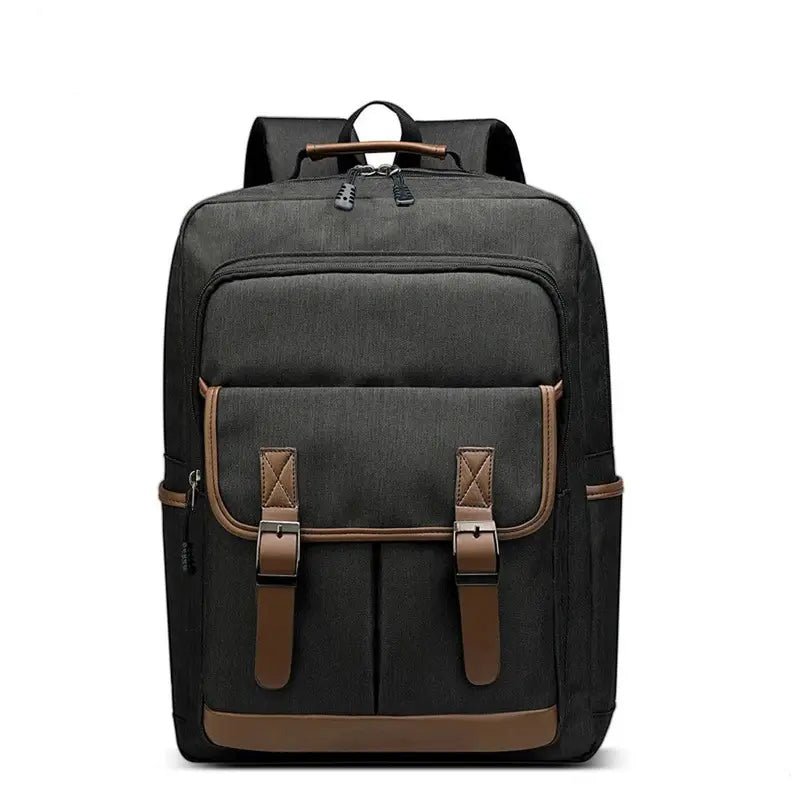 Sac à dos noir avec accents en faux cuir marron et plusieurs compartiments pour femme