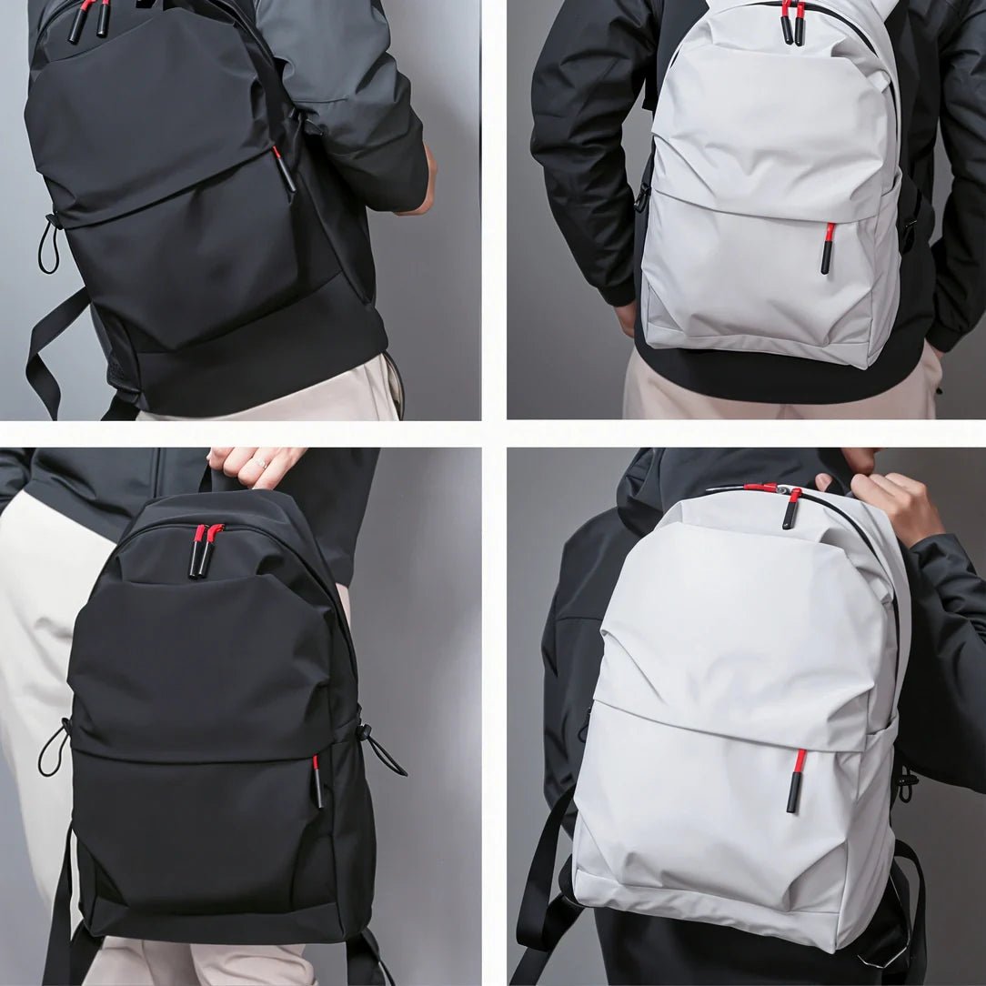 Sac à dos minimaliste noir et blanc pour adolescents avec accents de fermeture éclair rouges