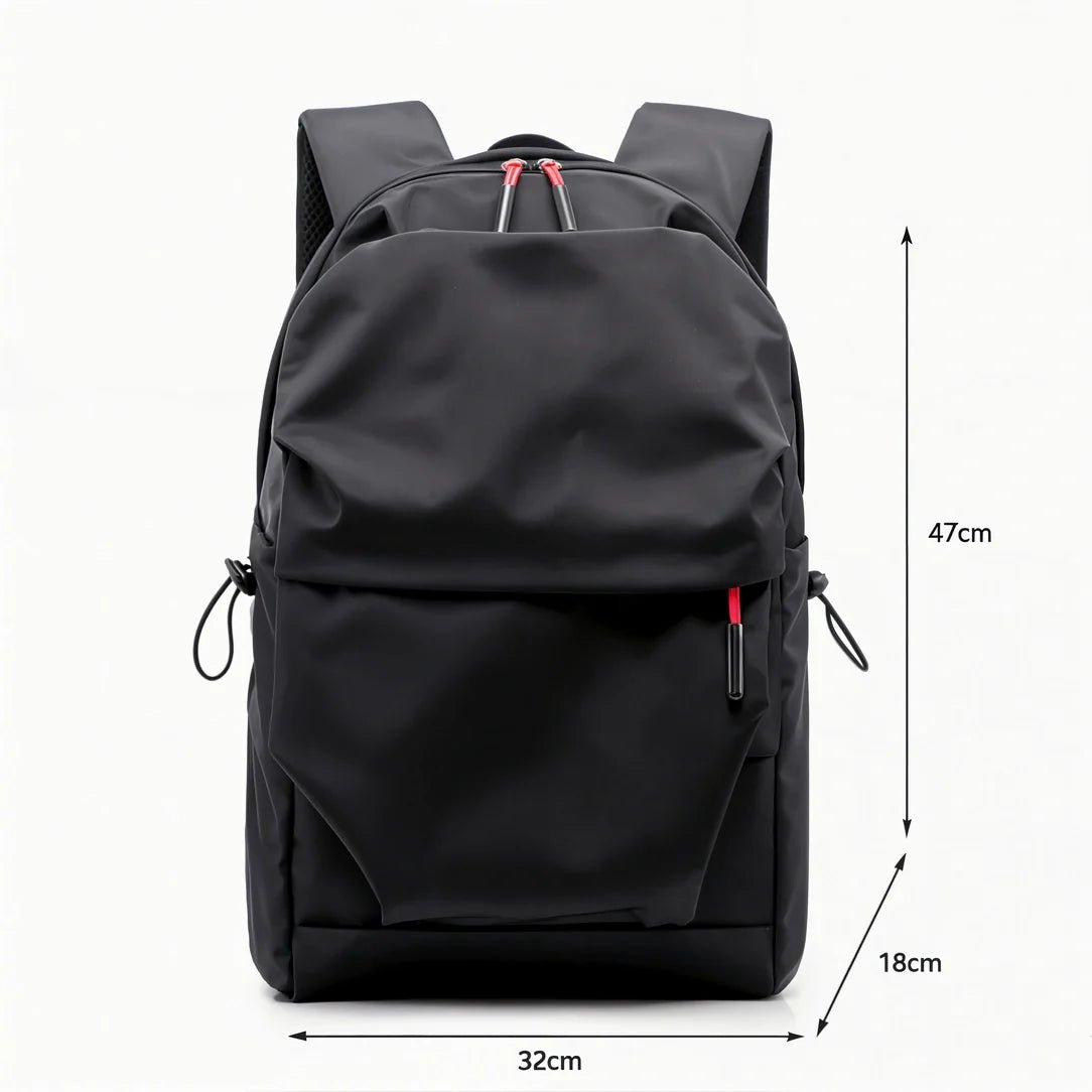 Sac à dos en nylon noir avec accents de fermeture éclair rouges et poches latérales à cordon pour ados et collégiens