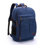 Sac à dos en toile bleu marine avec accents marron et multiples compartiments zippés