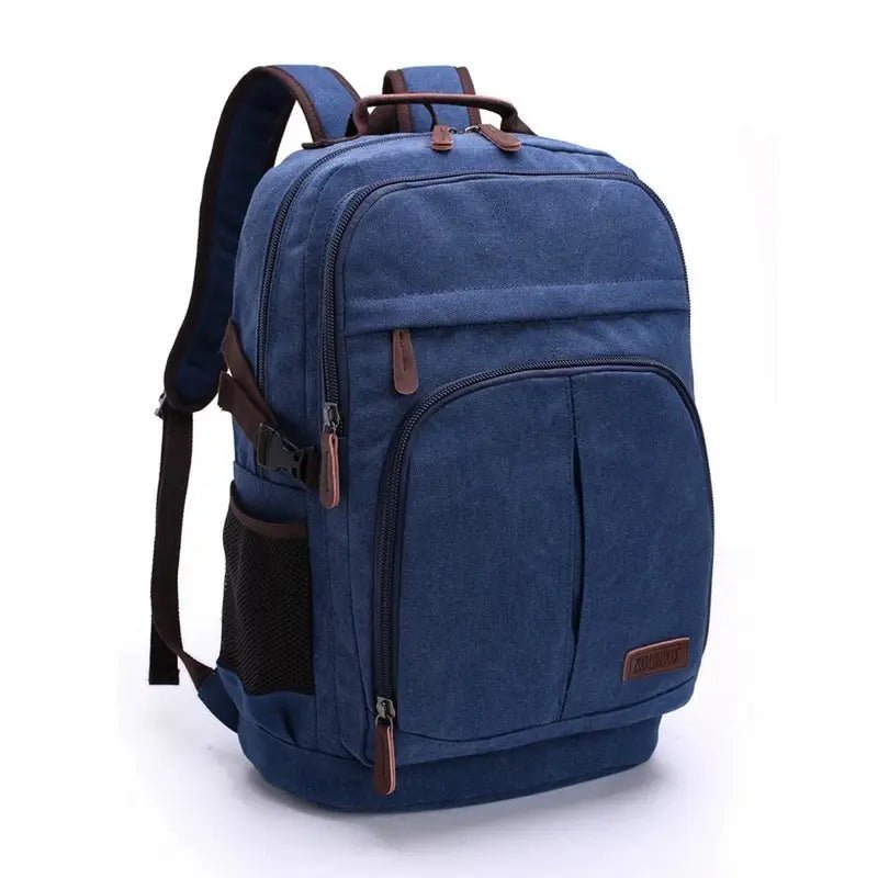 Sac à dos en toile bleu marine avec accents marron et multiples compartiments zippés