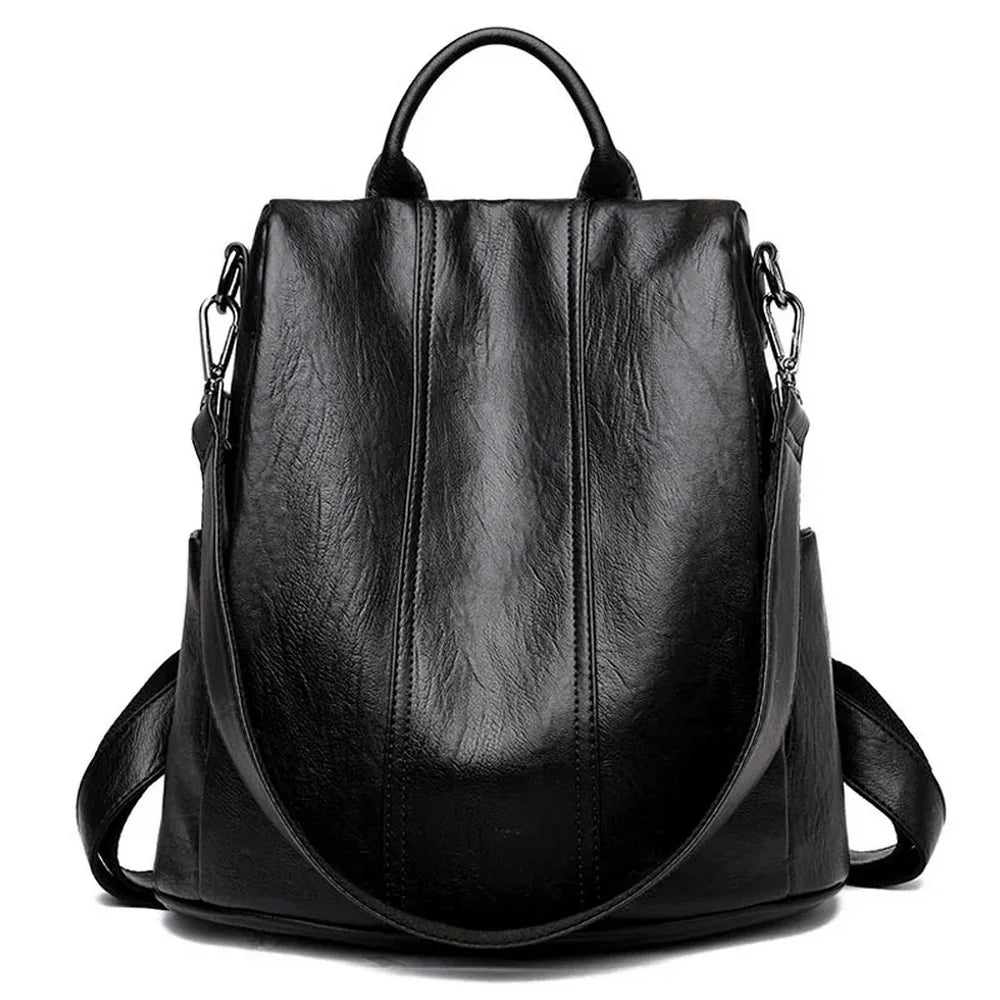 Sac à dos en cuir noir femme avec anti-vol, bretelles et poignée supérieure