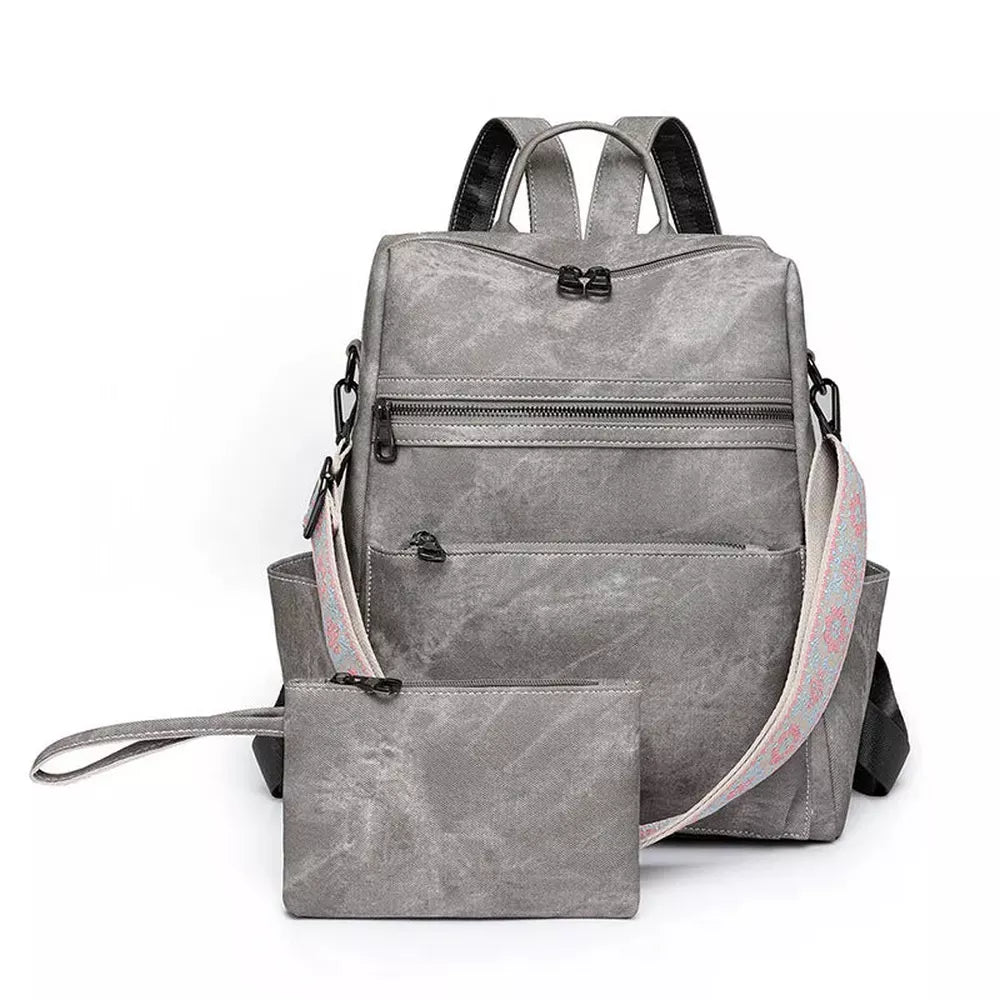 Sac à dos en cuir gris vintage et pochette assortie, look distressed élégant