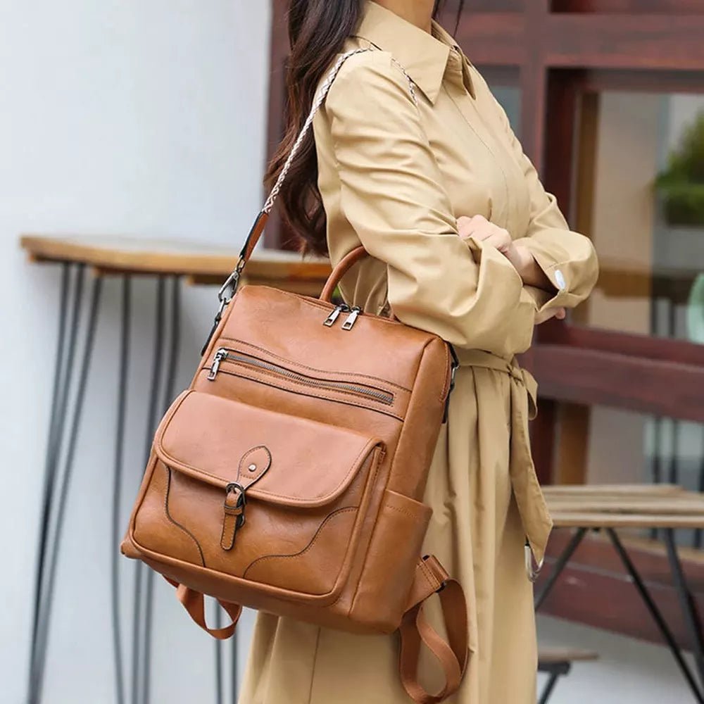 Sac à dos en cuir marron convertibles avec poches zippées et rabat avant