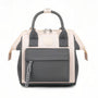 Sac à dos mini Plume Claire beige et gris avec accents cuir noir 2023