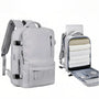 Sac 40x20x30 : sac à dos gris clair avec compartiments multiples et housse ordinateur en tissu durable