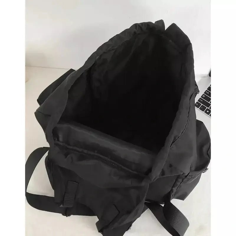 Sac à dos baroudeur homme noir ouvert avec poche intérieure pour rangement