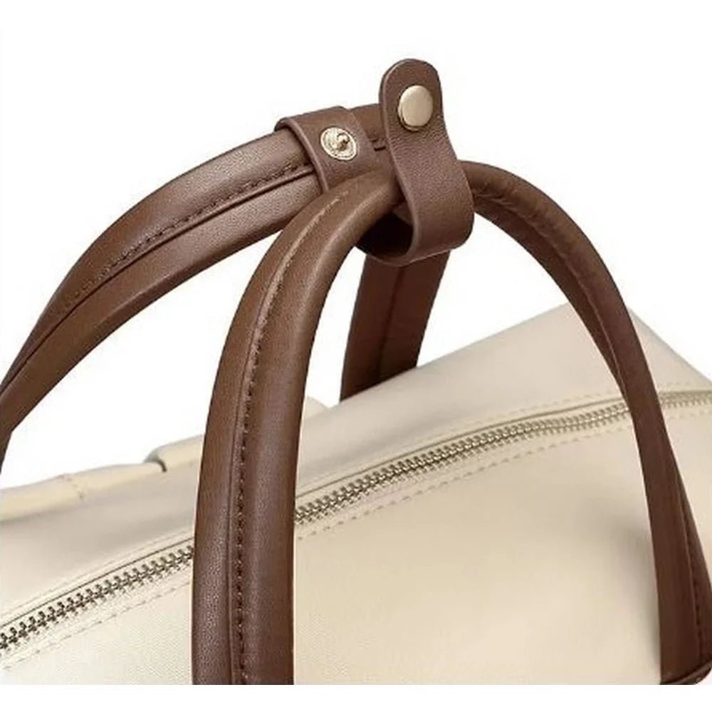 Sac à dos beige femme avec poignée en cuir marron et fermeture à clip