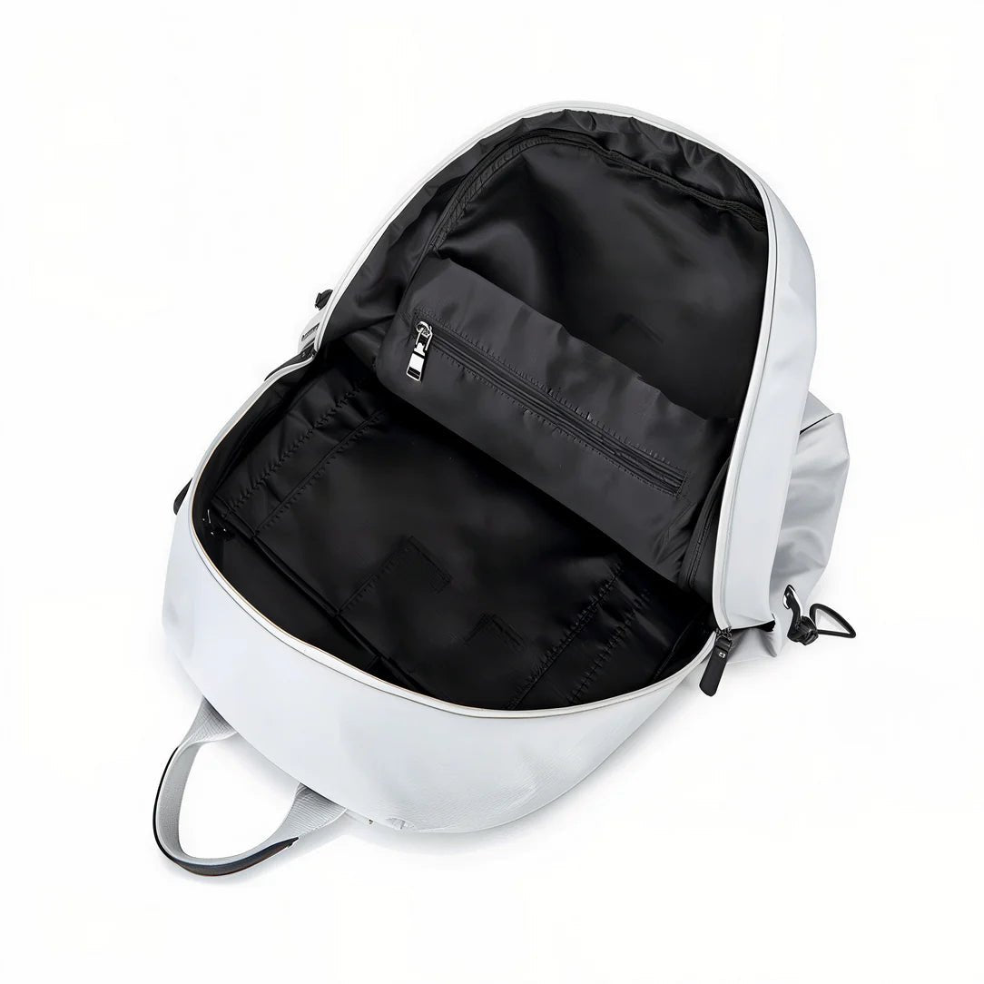 Sac à dos collège MoovePack gris clair ouvert avec intérieur noir et poche zippée intérieure