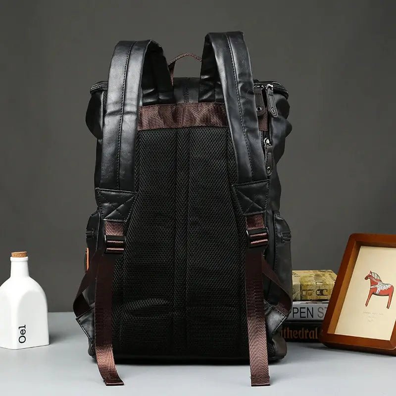 Sac à dos cuir homme décontracté en faux cuir noir avec rembourrage en mesh et bretelles ajustables