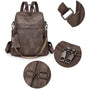 Sac à dos en cuir souple marron foncé avec bretelles ajustables et pendentif tassel