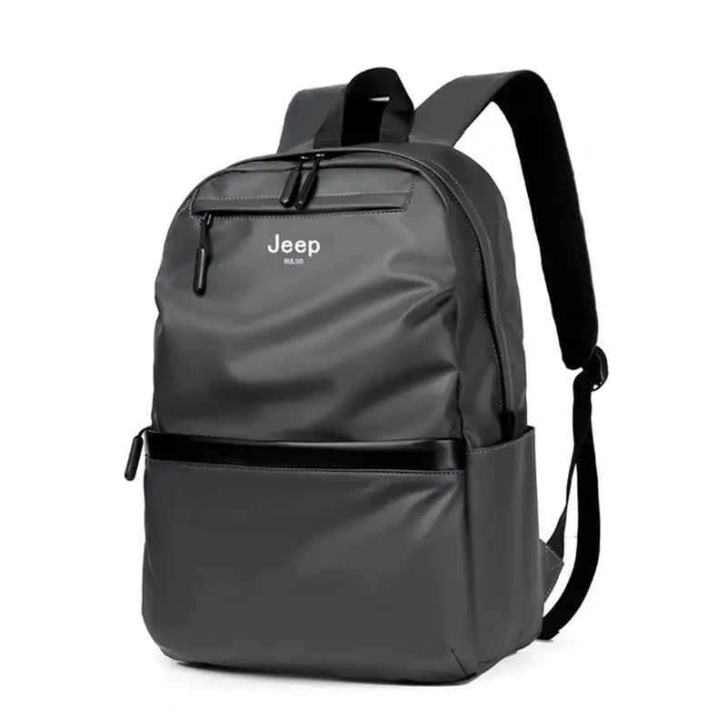 Sac à dos de classe sombre gris avec trim noir et plusieurs compartiments zippés