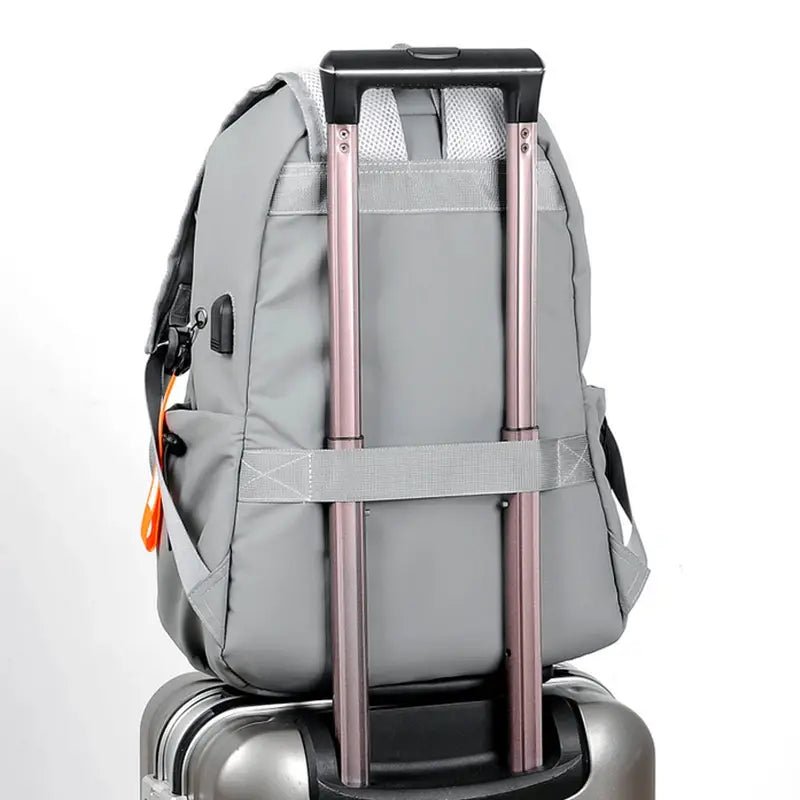 Sac à dos de lycée gris avec manchette trolley pour bagages