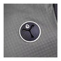 Patch rond noir et blanc avec un Y stylisé et une goutte, pour Sac à dos de randonnée 40L