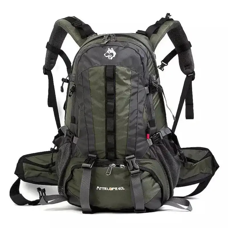 Sac à dos de randonnée 40L vert foncé et gris avec plusieurs compartiments et bretelles ajustables
