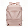 Sac à dos rose poudré 40L antivol avec accents noirs et anses tressées