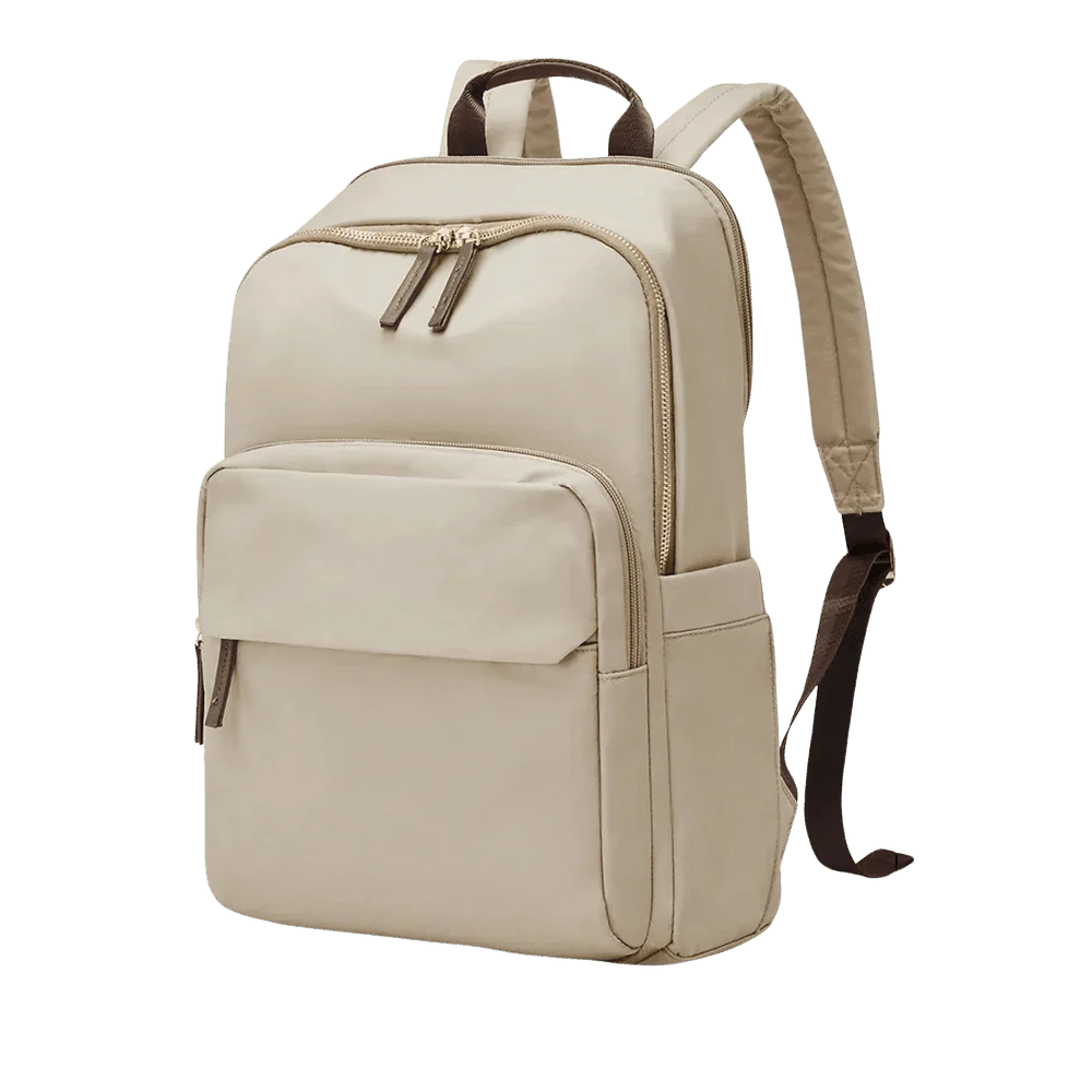 Sac à dos d’université femme beige avec poche avant, deux zippers supérieurs et bretelles marron