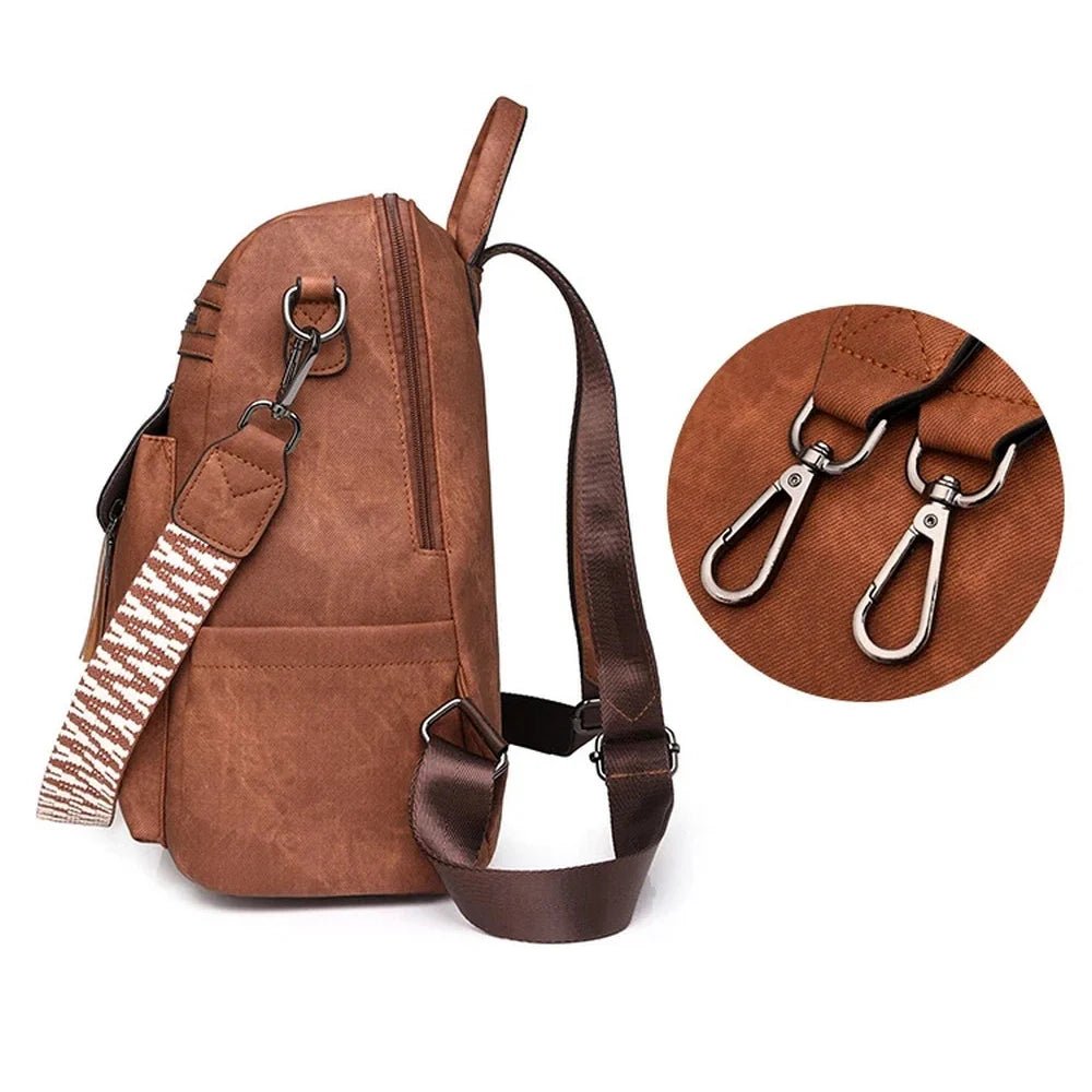 Sac à dos en cuir végétal brun avec bandoulière détachable et style élégant