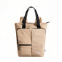 Sac à dos en tissu beige avec accents noirs et détails de zip Bagsmart