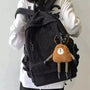 Sac à dos en velours noir avec porte-clés ours brun et poche pratique