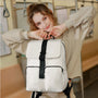 Sac à dos Equinoxe blanc avec accents et sangles noirs en nylon