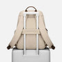 Sac à dos étudiant femme beige avec manchette de bagage et poignée en cuir marron