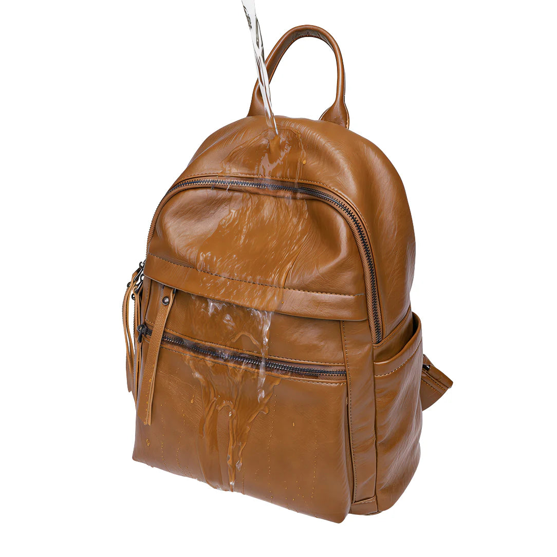 Sac à dos femme en cuir tanné avec design minimaliste et fermetures éclair noires