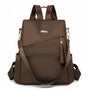 Sac à dos en cuir marron Graine d’Or avec franges et sangles ajustables