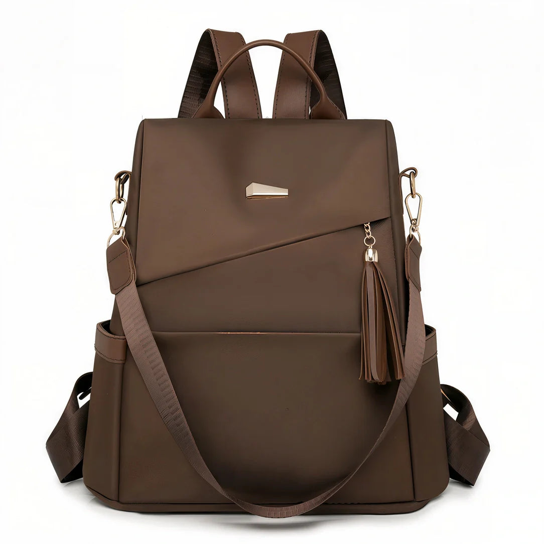 Sac à dos en cuir marron Graine d’Or avec franges et sangles ajustables