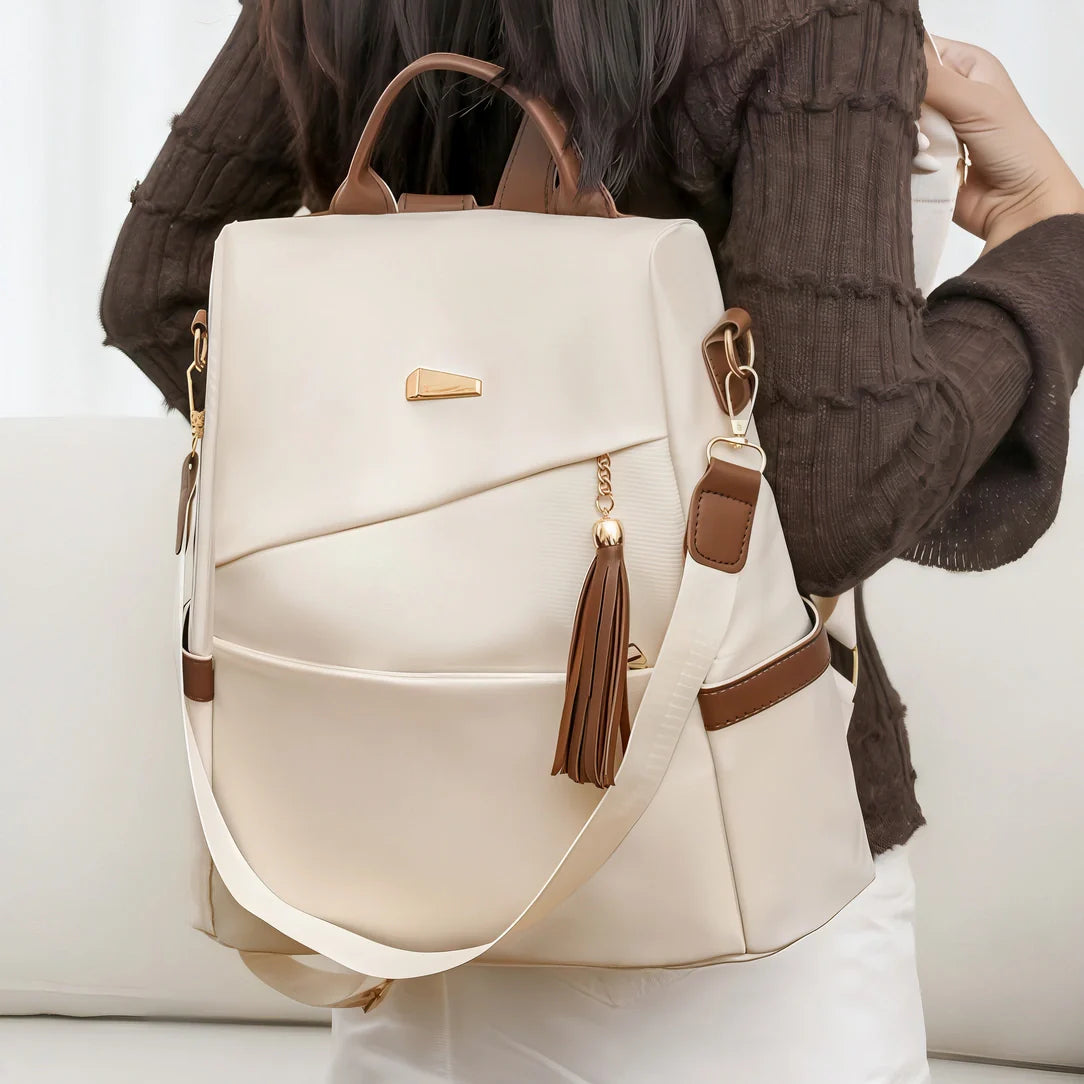 Sac à dos Graine d’Or crème avec accents marron et pompon