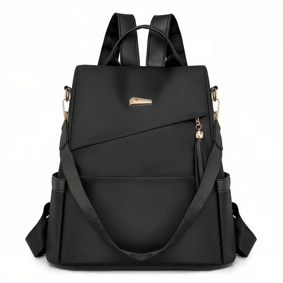 Sac à dos noir en nylon avec fermetures dorées et sangles ajustables
