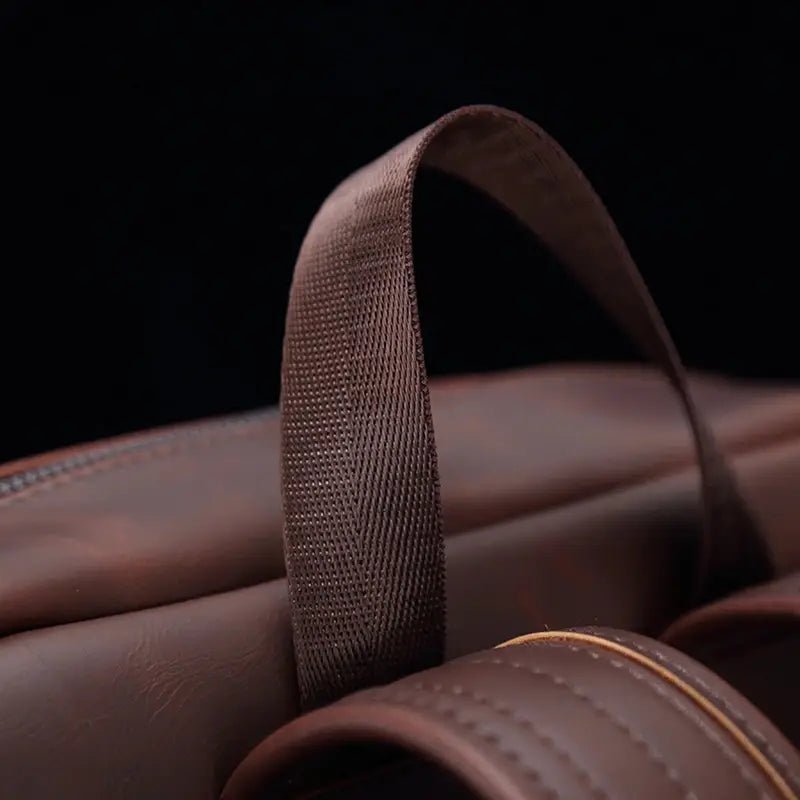 Sac à dos homme cuir vintage en cuir marron avec poignée solide et compartiments zippés