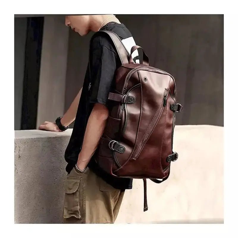 Sac à dos homme en cuir en faux cuir brun foncé avec plusieurs zippers et boucles