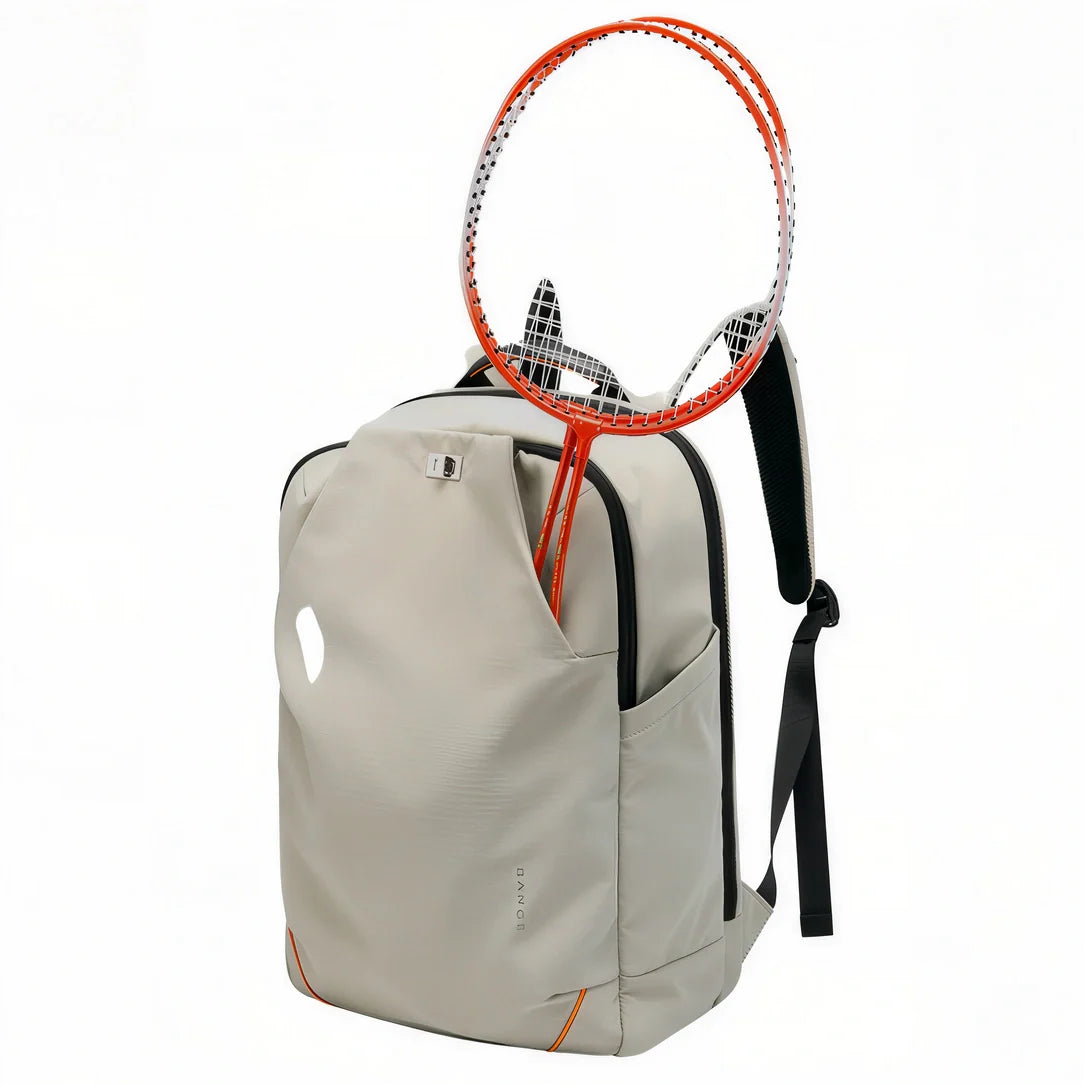 Sac à dos homme Nexar gris avec accents orange et design raquette de badminton