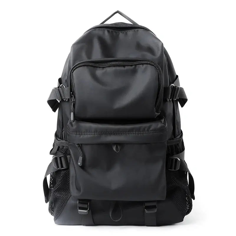 Sac à dos homme tendance en nylon noir avec poches zippées et bretelles ajustables