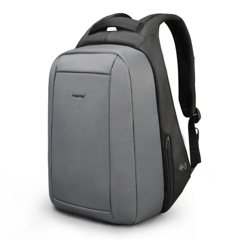Sac à dos informatique gris et noir avec plusieurs compartiments et sangle rembourrée