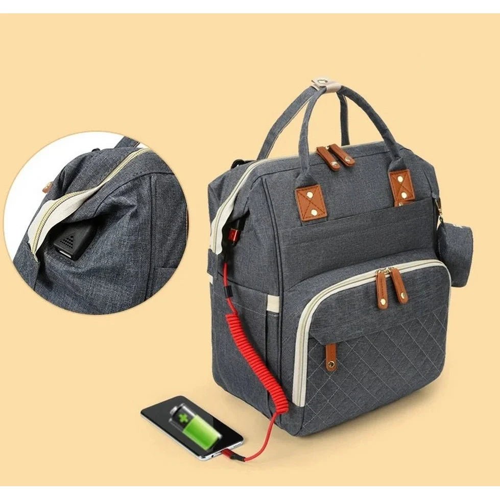 Sac à dos à langer 20L multipoches gris avec port de chargement USB externe