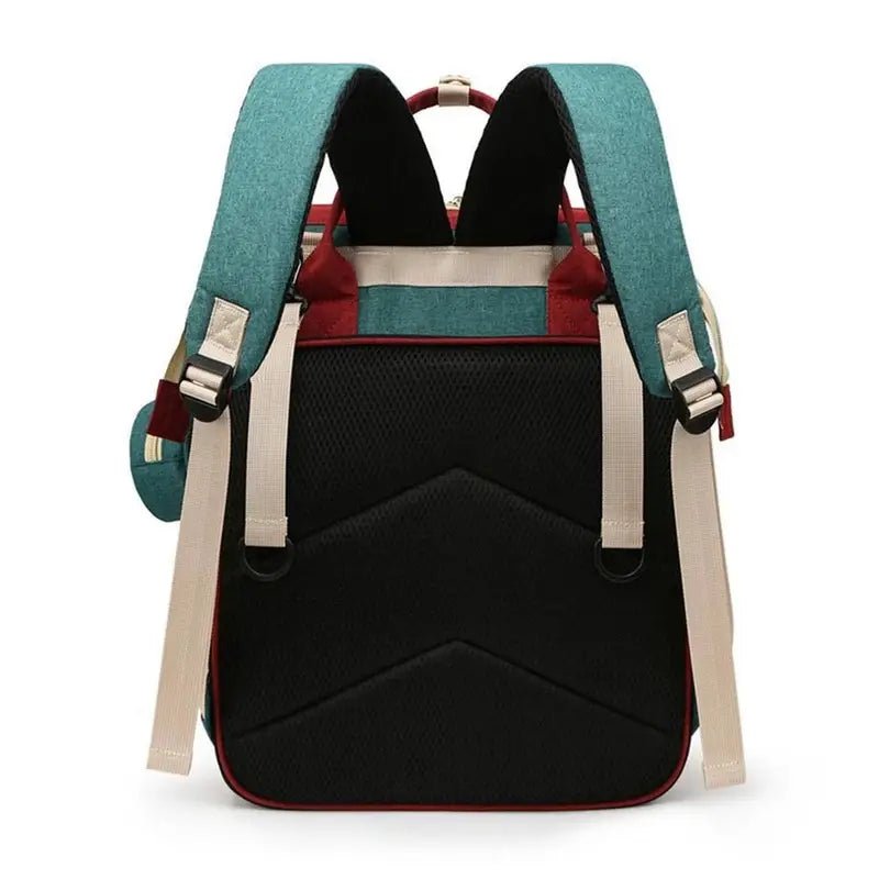 Sac à dos à langer 20L multipoches en teal, bordeaux et beige avec bretelles rembourrées