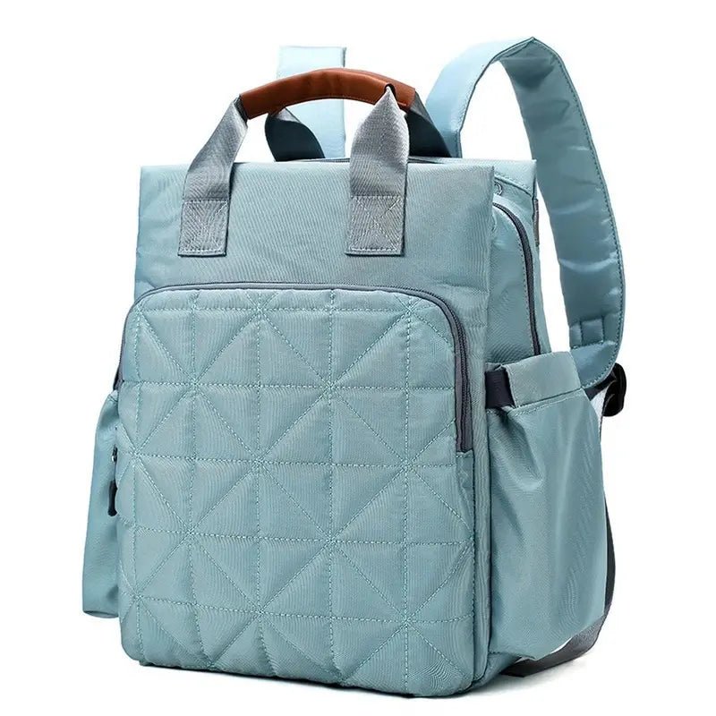 Sac à dos à langer bébé en bleu clair avec poignée et bretelles rembourrées