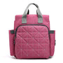 Sac à dos à langer bébé rose matelassé avec poignées et bordures grises