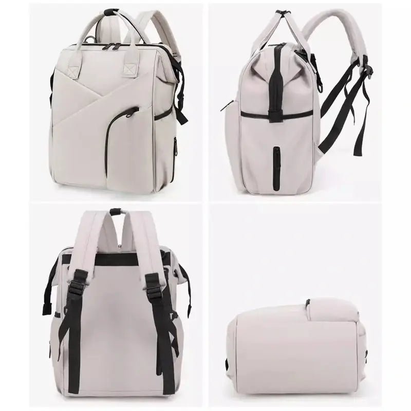 Sac à dos à langer chic gris clair avec plusieurs poches, accents noirs et bretelles