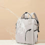 Sac à dos à langer chic résistant à l’eau avec plusieurs compartiments gris élégants