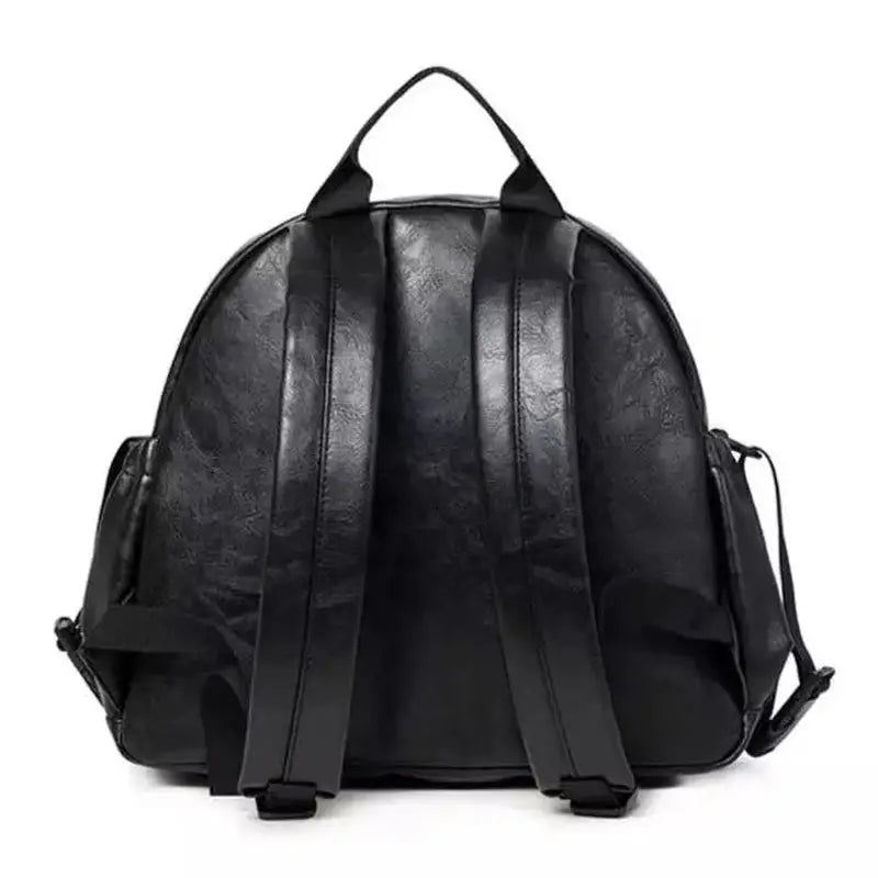 Sac à dos à langer en cuir pour bébé avec cuir synthétique noir et bretelles réglables