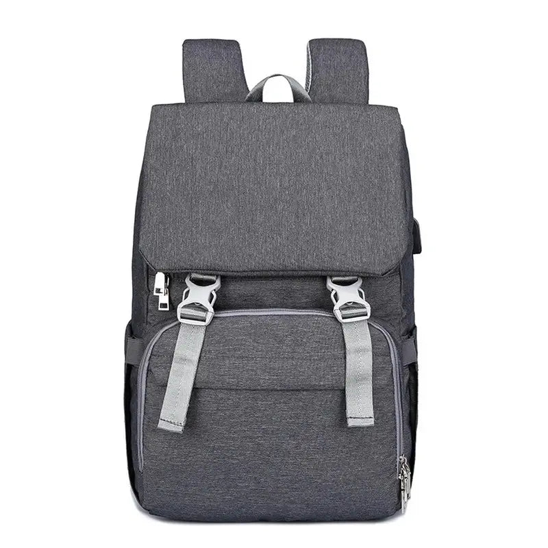Sac à dos à langer ergonomique en gris foncé avec bretelles et boucles gris clair