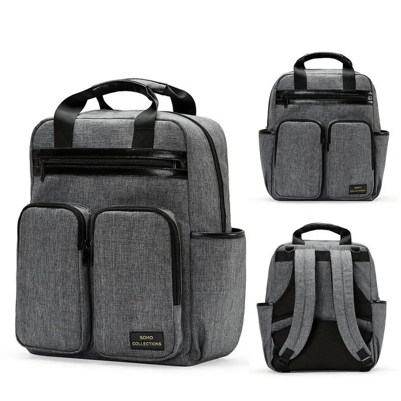 Sac à dos à langer gris en tissu gris avec accents noirs et multiples poches extérieures