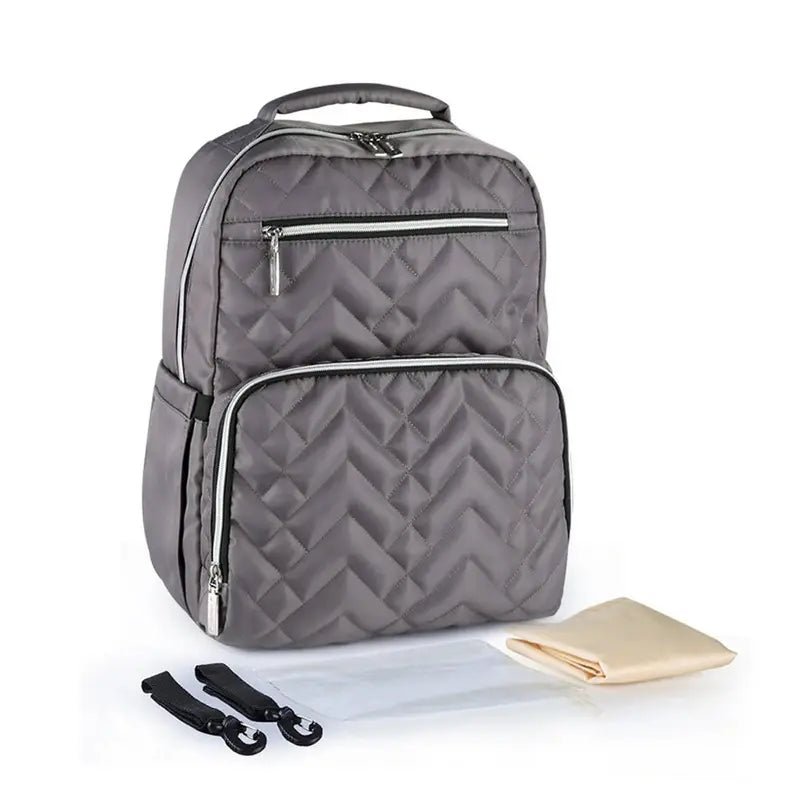 Sac à dos à langer isotherme en gris matelassé avec zippers blancs et deux attaches pour poussette