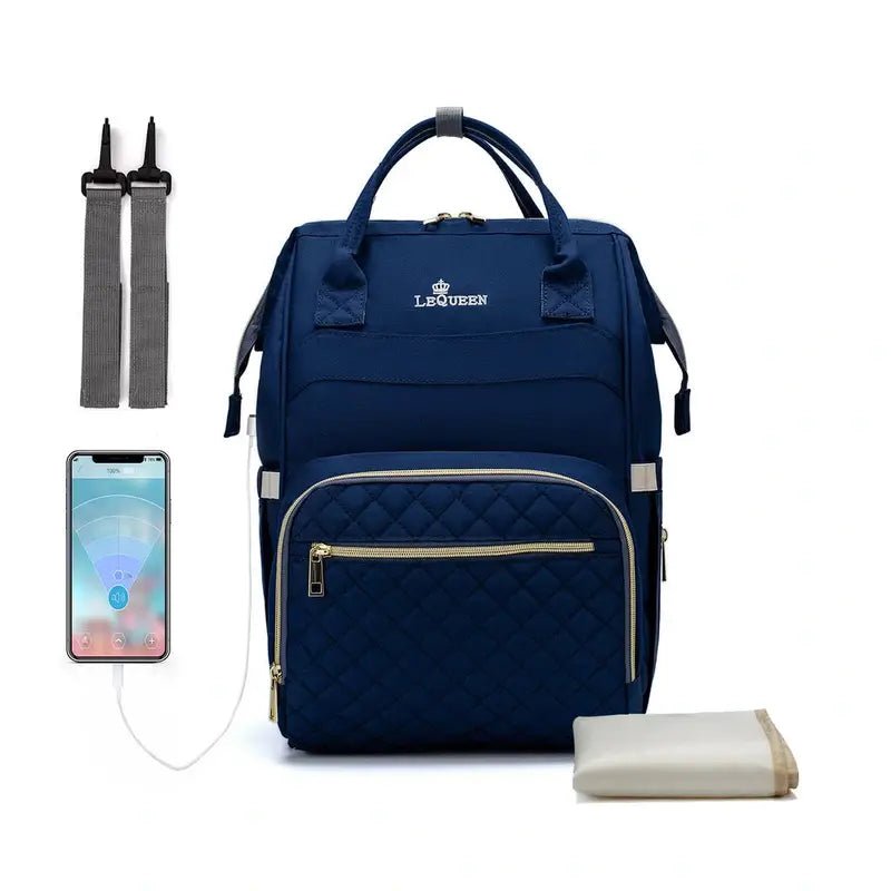 Sac à dos à langer le Queen en bleu marine avec rembourrage, zippers dorés et tapis change