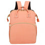Sac à dos à langer lit en peach avec poignées supérieures et bretelles d’épaule
